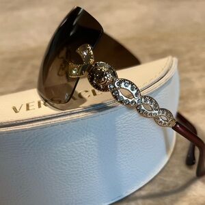 Versace Women’s rimless Medusa Sunglasses